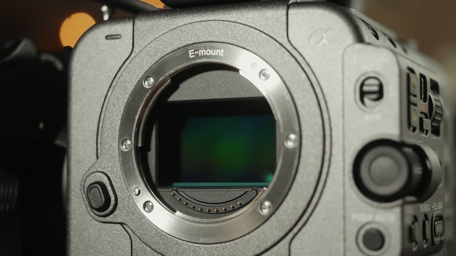 Close-up of a Sony cinema camera E-mount with the full-frame sensor visible behind the open throat