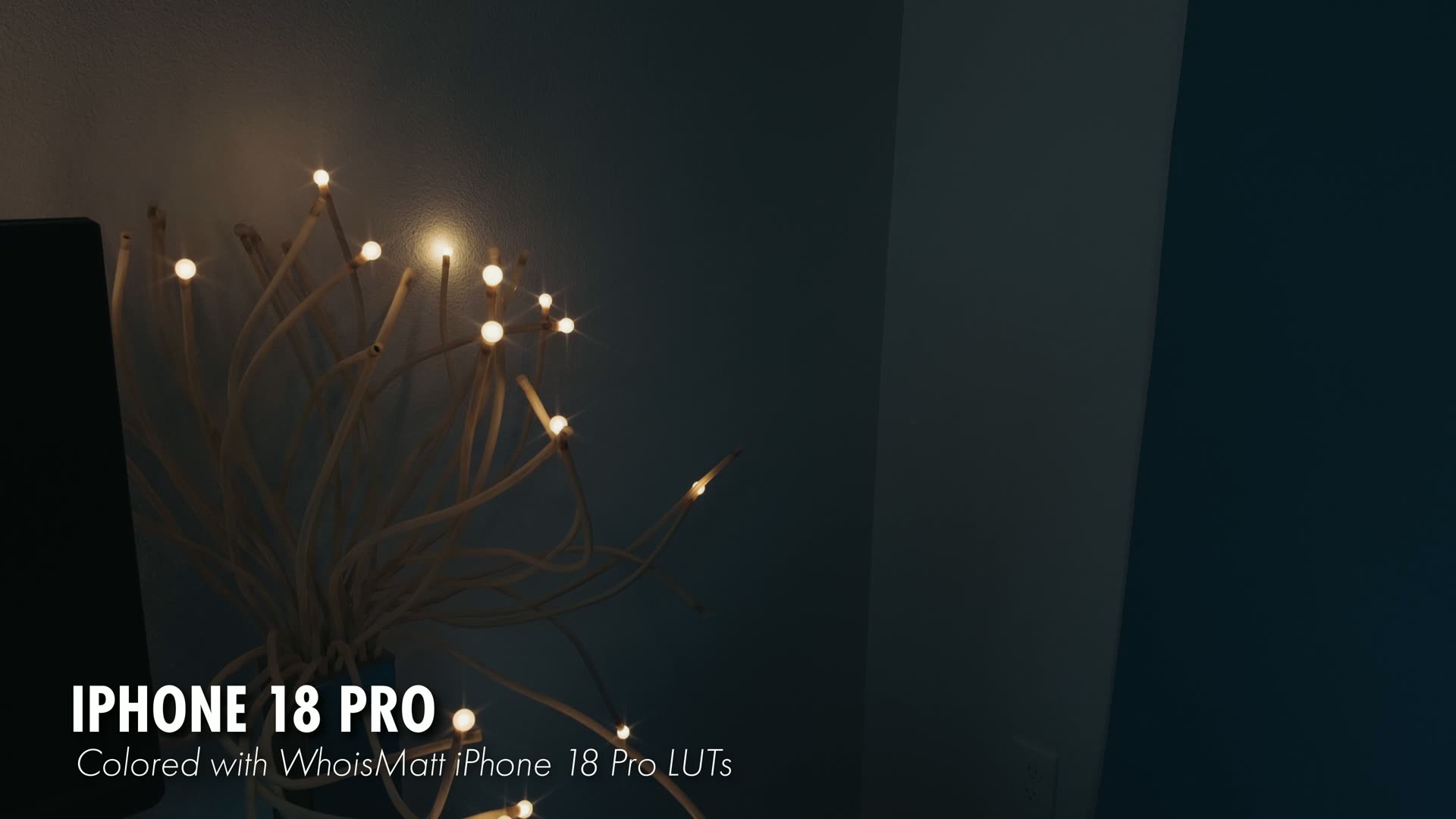 String lights showing starburst reflections filmed on a stopped-down iPhone 18 Pro