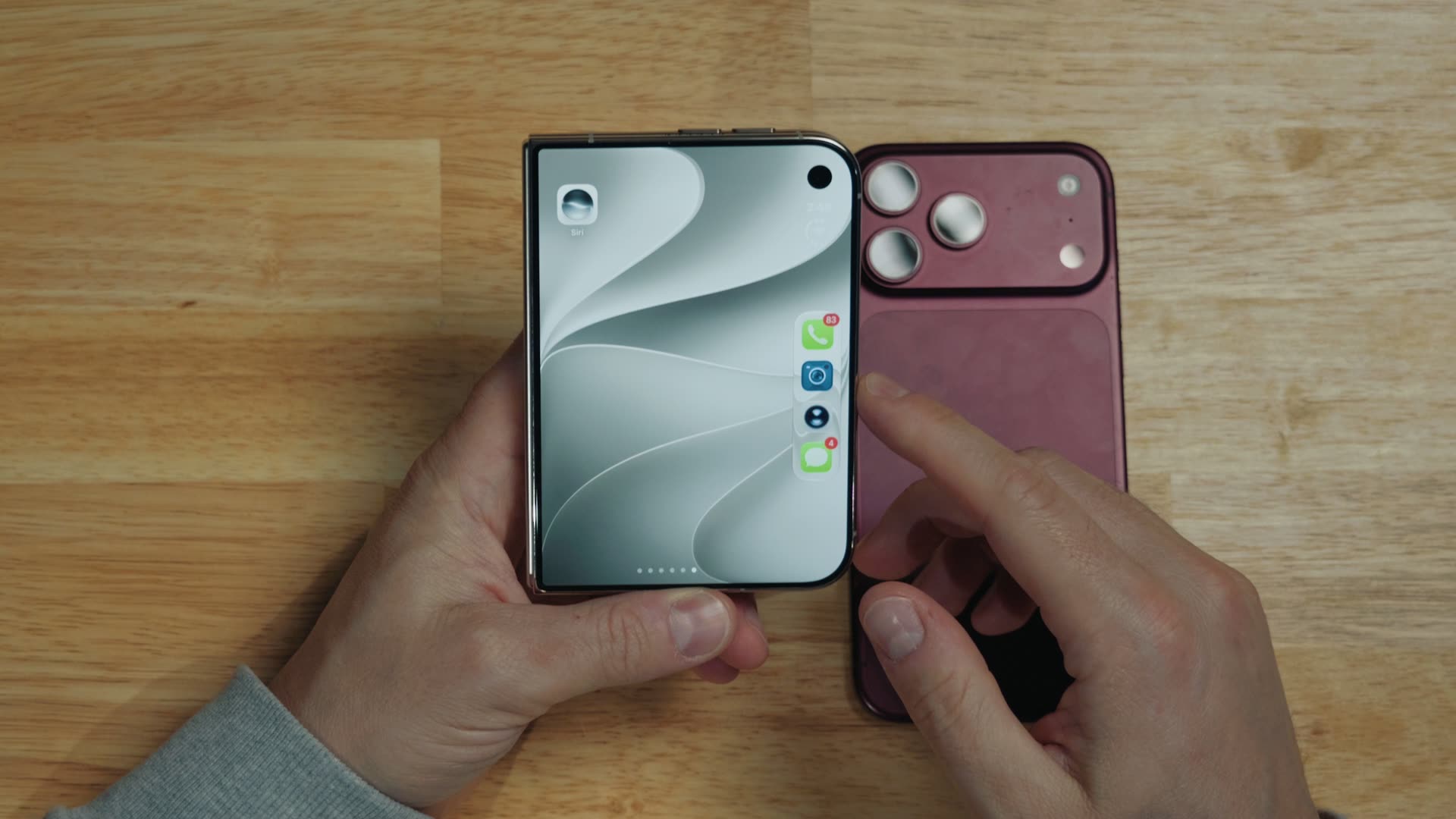 The unfolded iPhone Duo home screen with the dock placed along the right side of the display