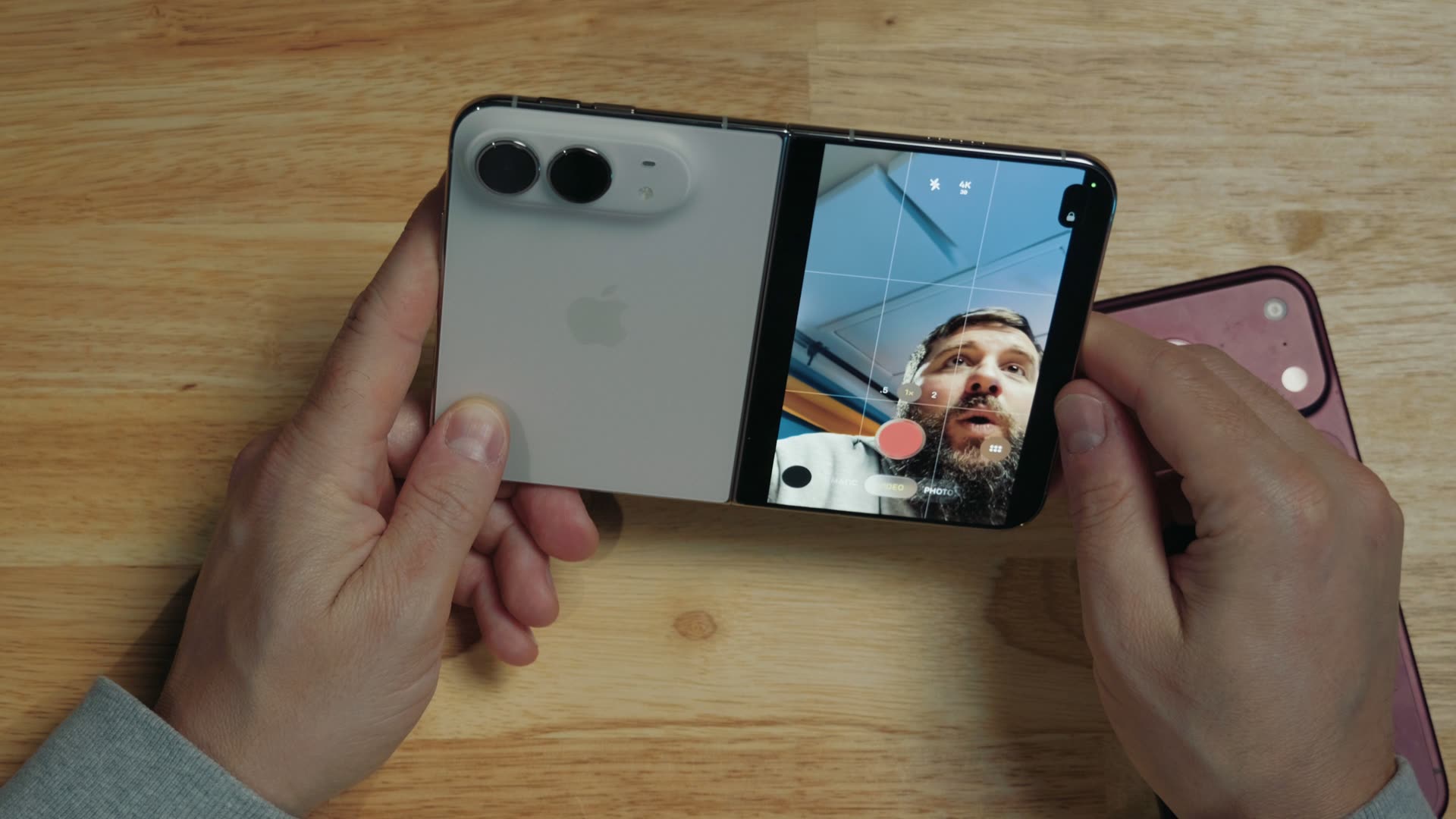 Duo Preview on the iPhone Duo: the rear main camera pointed at Matt while the outer screen shows his live framing