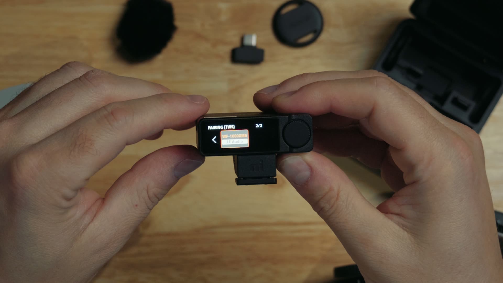 Sony ECM-W5 receiver screen showing the WF-1000XM6 earbuds paired in LE Audio mode